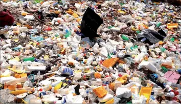  ??  ?? Large amounts of rubbish made from plastic can be seen washed-up on the shores of the harbour at Port Moresby, Papua New Guinea. — Reuters photo