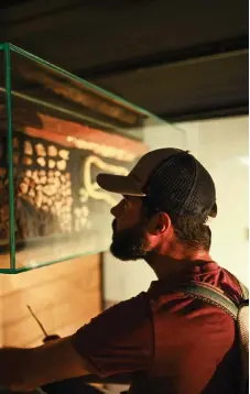  ?? ?? A visitor looks at the remains of a train track, to be exhibited to the public at the Museum of Memory and Human Rights, in Santiago, Chile.