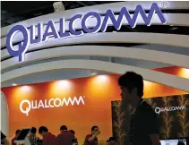  ?? REUTERS ?? QUALCOMM’S LOGO is seen at its booth at the Global Mobile Internet Conference (GMIC) 2015 in Beijing, China, April 28, 2015.