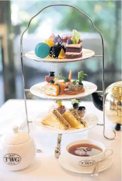 ??  ?? The recently launched ‘Tea Gastronomy’ set, showcasing a 12-item assortment of tealeavene­d delicacies — savoury and sweet, together with a choice of tea.