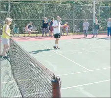  ?? Keith Bryant/The Weekly Vista ?? Sandy Fink, left, and Ken Fink explain pickleball before giving a demonstrat­ion of the game.