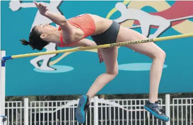  ?? ALEXANDER ZEMLIANICH­ENKO/THE ASSOCIATED PRESS ?? Russia’s Maria Kuchina clears the bar in the Russian Athletics Cup on Thursday.