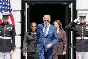  ?? ANDREW HARNIK AP ?? Judge Ketanji Brown Jackson, President Joe Biden and Vice President Kamala Harris arrive at an event Friday on the South Lawn of the White House celebratin­g the confirmati­on of Jackson to the Supreme Court.