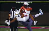  ??  ?? Ball State safety Brett Anderson II intercepts a pass intended for San Jose State’s Isaiah Hamilton during the second half Thursday.