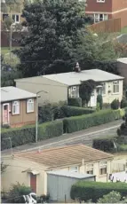  ??  ?? 0 Prefabs at Southhouse which were demolished in 1962 (top), a woman cleans the windows of her Sighthill prefab in 1966; Craigour prefabs, demolished in the late 1990s.