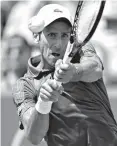  ?? Associated Press ?? ■ Novak Djokovic returns to Marin Cilic in a semifinal match at the Western &amp; Southern Open tennis tournament Saturday in Mason, Ohio.