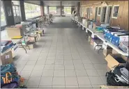  ??  ?? Rows of tables full of donated school supplies are ready to be sorted and then stuffed into backpacks as part of the North Penn Educationa­l Foundation’s third annual “Builda-bag” drive.