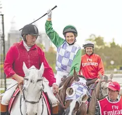  ??  ?? WINNER: Teresa Palmer as Michelle Payne in the movie Ride Like A Girl. Picture: Transmissi­on Films