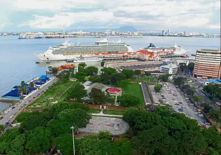  ??  ?? More to come: An aerial view of two passenger cruise liners berthing at Swettenham Pier in George Town in this