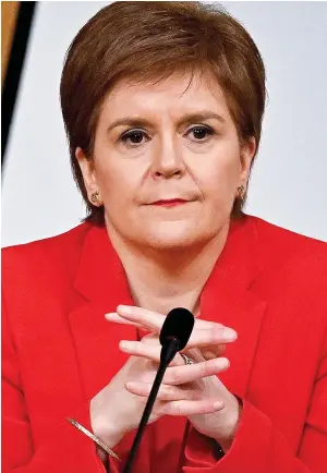  ??  ?? Holyrood grilling: First Minister Nicola Sturgeon defending herself during an eight-hour session at the Salmond Inquiry this month