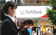  ?? — AFP photo ?? SoftBank’s US$8.9 billion annual net loss was bigger than it had expected.