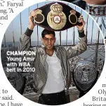  ??  ?? CHAMPION Young Amir with WBA belt in 2010
