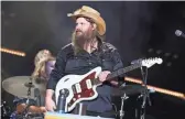  ??  ?? Chris Stapleton’s “Broken Halos” is nominated for single of the year and song of the year for the Country Music Associatio­n Awards.