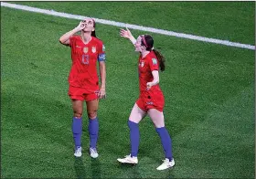  ?? Associated Press ?? Sipping tea: United States' Alex Morgan, left, celebrates her side's second goal during the Women's World Cup semifinal soccer match against England.