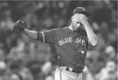  ?? MICHAEL DWYER / THE ASSOCIATED PRESS ?? Blue Jays all-star pitcher J.A. Happ says he would rather stay in Toronto, but adds he “can handle” the trade rumours.