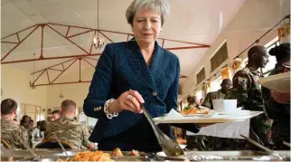  ??  ?? Making a meal of it: Theresa May is struggling to form a coherent Tory strategy on Brexit