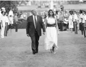  ?? PHOTO: BLOOMBERG ?? US President Donald Trump ( left) and First Lady Melania Trump during the Salute to America event on the South Lawn of the White House in Washington, on Saturday