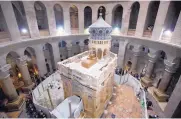  ?? SEBASTIAN SCHEINER/ASSOCIATED PRESS ?? The restored Edicule stands in the center of the Church of the Holy Sepulchre in Jerusalem’s Old City. The structure had not been restored for more than 200 years.