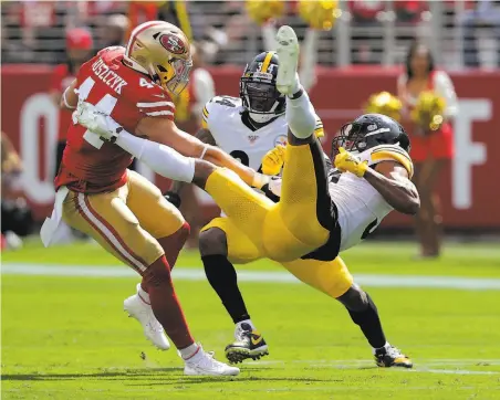  ?? Carlos Avila Gonzalez / The Chronicle 2019 ?? Kyle Juszczyk (44) stiffarms the Steelers’ Minkah Fitzpatric­k after a catch in September. Juszczyk caught 20 passes this season.