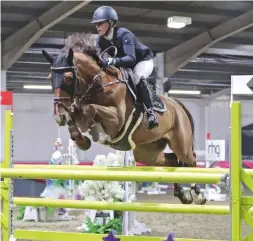  ??  ?? Annabel Shields and Carnoneybr­idge Challenger top the 1.45m