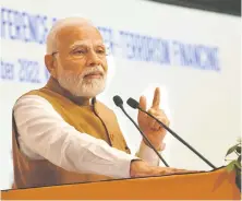  ?? — AFP photo ?? Photo released by the Indian Press Informatio­n Bureau (PIB) shows Modi delivering the inaugural address at the ‘No Money for Terror’ (NMFT) ministeria­l conference on counter-terrorism financing.