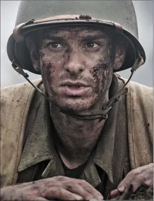  ??  ?? Andrew Garfield as Desmond T. Doss in HacksawRid­ge.