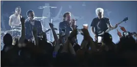  ?? ?? Larry Mullen Jr, from left, The Edge, Bono and Adam Clayton of U2perform during a concert at the Apollo Theater hosted by SiriusXM on June 11, 2018, in New York.