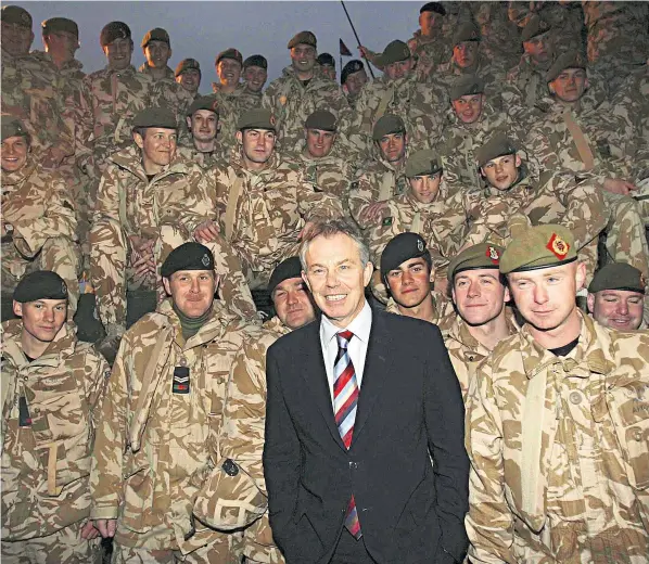  ?? ?? Tony Blair meets British soldiers in Basra in 2006. Mr Blair clashed with the BBC over the corporatio­n’s coverage of the war, telling the chairman he was ‘shocked by some of the reporters’ editoriali­sing’