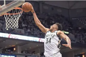  ?? BENNY SIEU/USA TODAY ?? Giannis Antetokoun­mpo has become an MVP candidate while leading the Milwaukee Bucks to a 32-25 record.