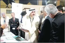  ?? KUNA photos ?? Top: Head of Kuwait Center for Islamic Arts is giving a specialist lecture as part of the Internatio­nal Aqaba Festival for Islamic Arts — Jordanian University at Aqaba honors Al-Ali and above: Al-Ali participat­ing in the booth specified for the
center...