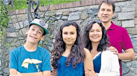  ??  ?? Natasha with her brother Alex and parents Nadim and Tanya. Her father yesterday backed a coroner who called on the Government to examine current food labelling laws