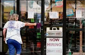  ?? Nam Y. Huh / Associated Press ?? A report from the Labor Department released Thursday showed that jobless claims fell by 29,000 last week to 348,000, a pandemic low.