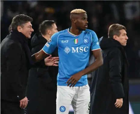  ?? AFP ?? Napoli manager Walter Mazzarri, left, with striker Victor Osimhen. The Italian is their second coach since Luciano Spalletti quit