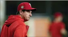  ?? ERIC GAY - THE ASSOCIATED PRESS ?? Phillies manager Rob Thomson watches batting practice before Game 2of the World Series against the Houston Astros. Thomson had a simple message before the National League champions took the field Thursday for their first spring training workout for pitchers and catchers. “Make sure that we ramp up appropriat­ely and make sure we don’t push it to try to impress anybody,” Thomson said. “Just go out there, be yourself.”