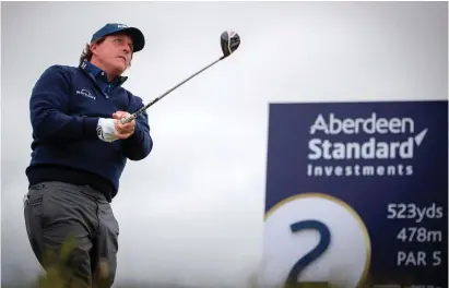  ?? KENNY SMITH/PA WIRE ?? Phil Mickelson follows the flight of his ball off the second tee at Gullane