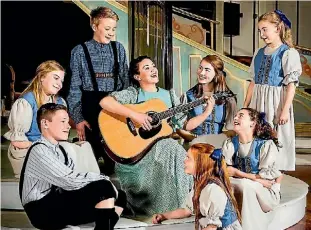  ?? SUPPLIED ?? Drury resident and Diocesan student Libby Johnston, right of the guitar, is playing Liesl von Trapp in The Sound of Music.