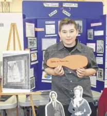  ?? LYNN CURWIN/TRURO NEWS ?? Hunter Douglas, a Grade 7 student at Pugwash District High School, chose Anna Swan as the topic of his heritage fair project. Hunter is related to the giantess.