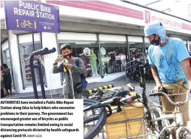  ?? NONOY LACZA ?? AUTHORITIE­S have installed a Public Bike Repair Station along Edsa to help bikers who encounter problems in their journey. The government has encouraged greater use of bicycles as public transporta­tion remains limited owing to social distancing protocols dictated by health safeguards against Covid-19.