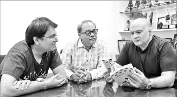  ??  ?? Rahul (Right), Jayant (Centre) and copywriter Manish Jhaveri (Left) interact during an interview with AFP in Mumbai.