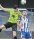  ??  ?? Heads up: Danny Wallace with Coleraine’s Eoin Bradley