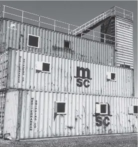  ?? CONTRIBUTE­D ?? This stack of shipping containers has been turned into a training facility for the Corner Brook Fire Department. The project cost $76,740.74 more than budgeted for.