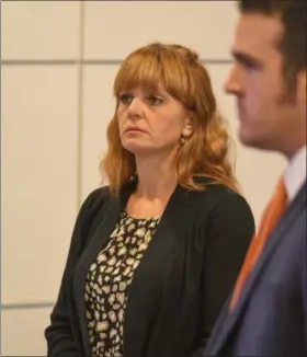  ?? ERIC BONZAR — THE MORNING JOURNAL ?? Julene M. Simko appeared alongside her attorney Michael Stepanik, in Lorain County Common Pleas Court Judge Mark A. Betleski’s courtroom for day three of her murder trial. The 38-year-old Vermilion woman is on trial for the alleged shooting death of...