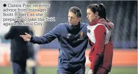  ??  ?? ● Cassia Pike receives advice from manager Scott Rogers as she prepares to take the field against Bristol City