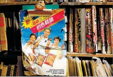  ?? CHINA DAILY ?? Collector Wu Kaisi runs a secondhand store in Guangzhou, Guangdong province, selling some 100,000 items from both home and abroad.