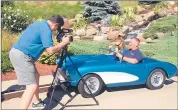  ?? DON STACOM | DSTACOM@COURANT.COM ?? PRODUCER Tom Mazzarella shoots a scene at Lake Compounce with Megan Major and Jerry Brick in a Zoomer’s Gas n’ Go car.