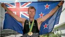  ?? PHOTOSPORT ?? Mahe Drysdale celebrates winning gold in the men’s singles at the 2016 Rio Olympic Games.