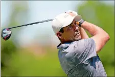  ?? LM OTERO/AP PHOTO ?? Scott Stallings hits his tee shot off the 18th hole during the second round of the Charles Schwab Challenge at the Colonial Country Club on Friday in Fort Worth, Texas.