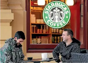  ?? KEVIN STENT/STUFF ?? Starbucks will reward staff with pay rises and stocks.