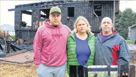  ?? MILLICENT MCKAY/JOURNAL PIONEER ?? Jake Reynolds, 22, with mom Lynn and father Tim following a house fire that destroyed the family’s home in Schurmans Point on Sept. 16.