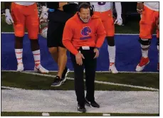  ?? (AP/David Zalubowski) ?? Bryan Harsin, shown on the Boise State sideline this season, was 69-19 in seven seasons with the Broncos. Harsin, who was Arkansas State’s coach in 2013, was named Auburn’s new coach Tuesday.